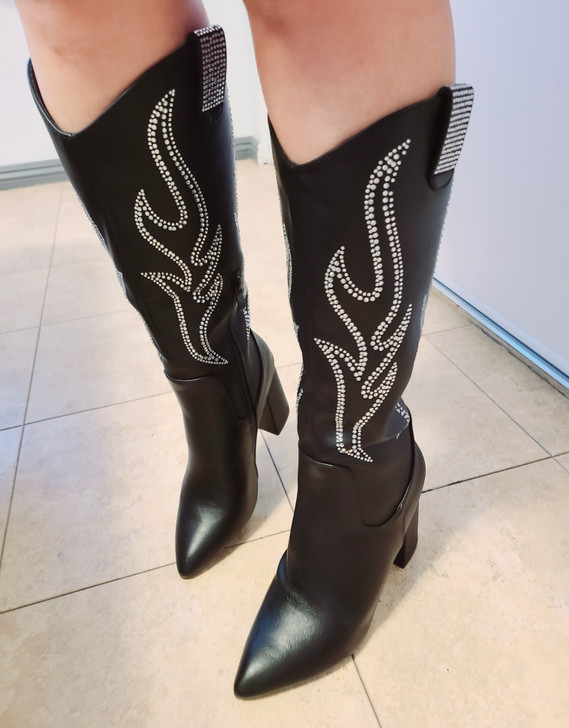 Elegant Women's black cowboy boots adorned with intricate silver studded patterns, showcasing a classic yet contemporary style. Perfect for adding a touch of western flair to any outfit