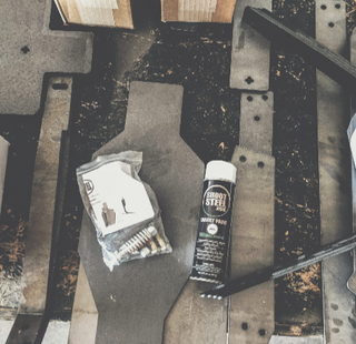 Steel target shipping preparation with protective packaging and hardware for secure delivery