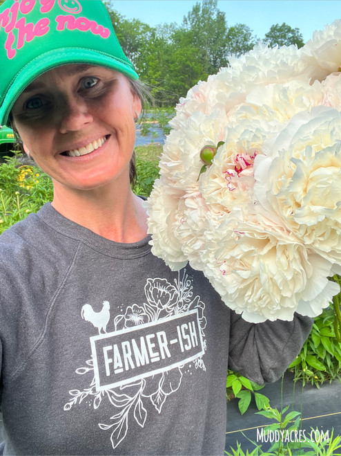 Lynsey Taulbee holding a bouquet of peony Shirley Temple.