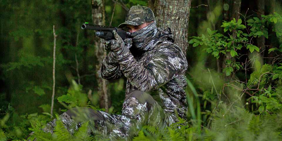 Hunter dressed in full camo clothing for spring Turkey Season hunting