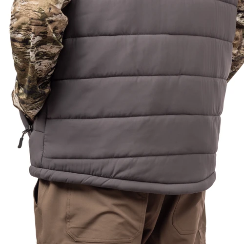 Drop tail hem and zipper hand pockets.