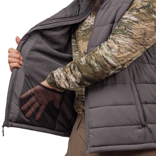 Interior stash pocket, zipper storm flap.