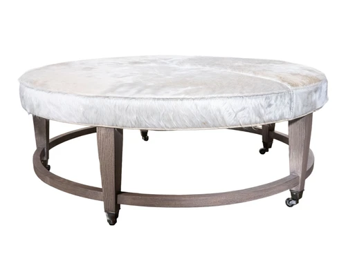 NIXSON ROUND OTTOMAN NATURAL HAIR ON HIDE LEATHER