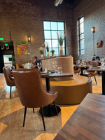 Luxurious Modern Restaurant Seating  with Calcutta Marble Tables and American Beauty Red Chairs - Made in USA  (SEATS  34)