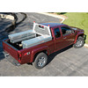 Weather Guard Model 1906-3-02 PROTECT-A-RAIL white headache rack on red truck bed, steel construction.