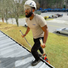 Tie Down Engineering STEP-N-SAFE PRO Extension Ladder Walk-through in use on a roof.