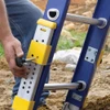 Werner D8220-2EQ fiberglass extension ladder, 300 lb rated, yellow and blue, D8200-2EQ series equalizer.