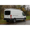 Topper #258120 10ft Van Rack with 58in Crossbars installed on white Ford Transit van.