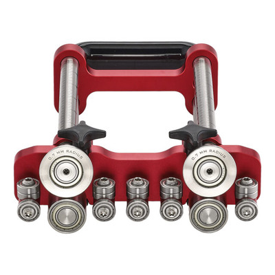 Malco Tool Two Station Bender roofing tool, red, with silver metal components and multiple dies.
