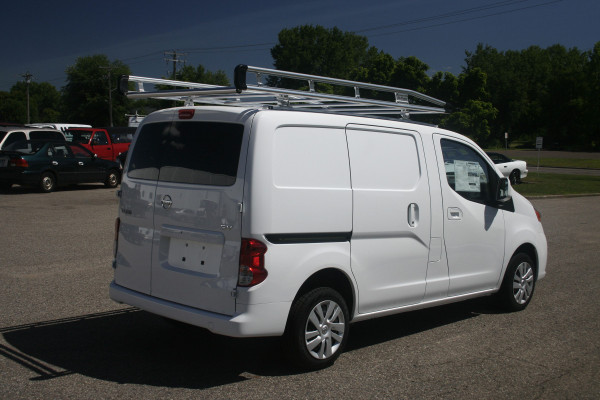 Prime Design AluRack Metris 135" WB aerodynamic ladder rack on a white van.