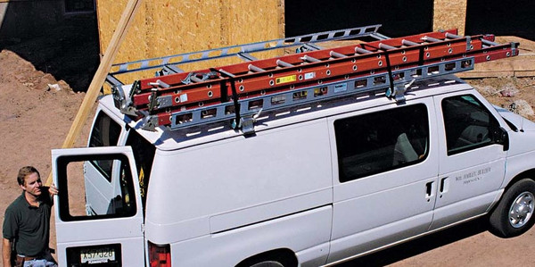 System One Contractor Rig Van Rack on a white van for easy load and unload van.