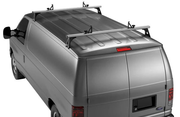 Thule TracRac silver 2 bar rack, aerodynamic van accessory for vans with rain gutters installed.