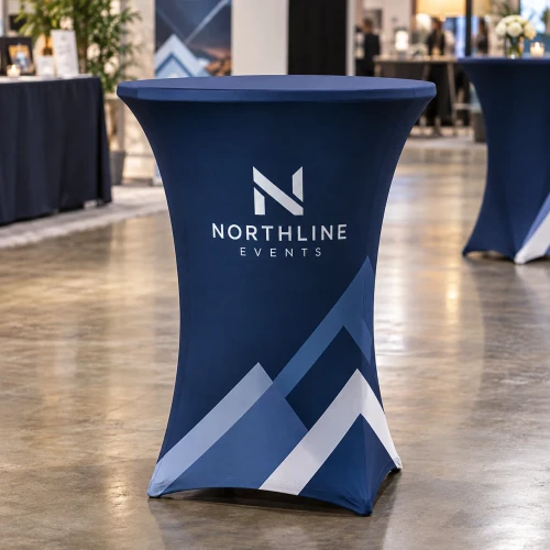 Navy custom cocktail table cover with business logo print at an event