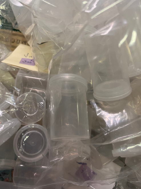 Bags of Vintage 35mm Plastic Film Containers