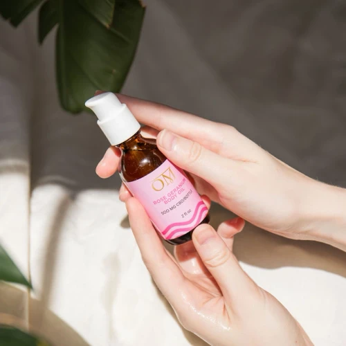 Luxurious body oil with rose geranium essential oil to nourish skin and hair