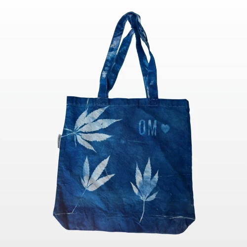 Cyanotype organic cotton tote bag sun print with iconic cannabis leaves branded gear