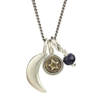 Teeny star charm paired with a sculpted moon charm and teeny gemstone