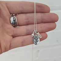 Rose silver oval charm