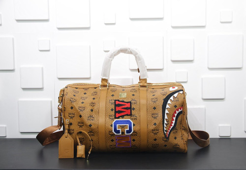 Buy High quality replica UA MCM Shark Weekender Visetos Cognac, Bag from HypeRepTime, best replica designer brand website