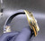 High quality replica Plain Jane Rolex Sky-Dweller gold case  black dial oysterflex rubber strap