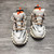 Buy UA High quality replica Balenciaga Triple 3.0  track2 sneakers white and orange from HypeRepTime, best replica designer brand website