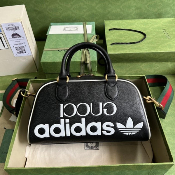 Buy High quality replica UA Adidas x Gucci mini black, duffle bag from HypeRepTime, best replica designer brand website