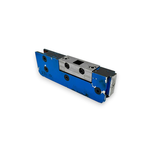An image of a discontinued patch fitting with the Leo Hardware custom made cam mounted to it.