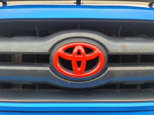 Gloss Red - Front Grille ABS Emblem Cover (2005-2011 Toyota Tacoma)