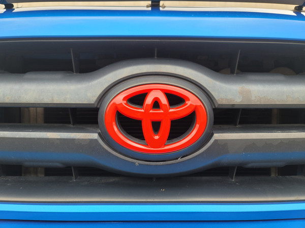 Gloss Red - Front Grille ABS Emblem Cover (2005-2011 Toyota Tacoma)