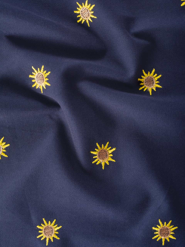 Sun Embroidered Navy Cotton Pleated Shorts Close Up