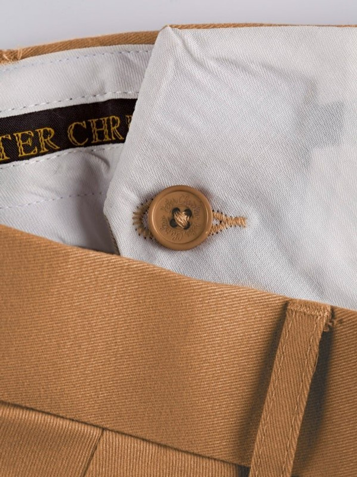 Close Up of Tan Brown Pleated Chino Trousers French Bearer