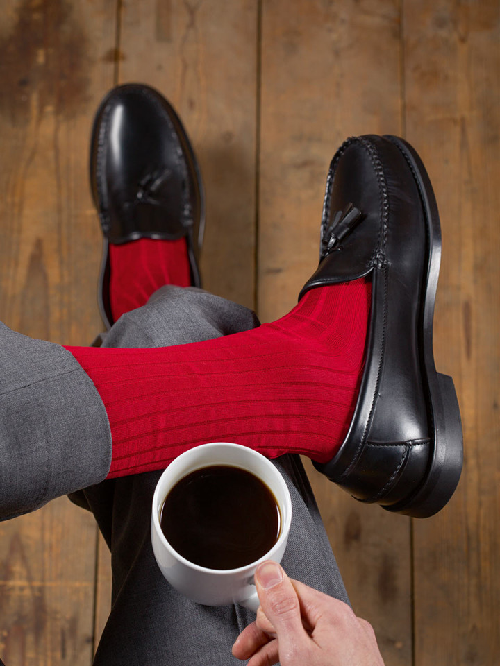 Model wears Men's Red Mercerised Cotton Knee High Socks