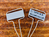 C-Series aluminum replacement plates with angled face – designed to fit standard C-Series garden marker wire legs. Rustproof, weather-resistant, and lightweight for durable plant labeling in flower beds, vegetable gardens, and landscaping. Made in the USA for long-term outdoor use.