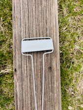 C-Series zinc garden marker with classic angled face plate and galvanized steel legs – ideal for labeling vegetables, herbs, and flowers in garden beds, pots, or raised planters. Weatherproof, rust-resistant, and reusable metal plant tag made in the USA for lasting outdoor use.