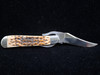 2006 Case XX 61953 L SS Amber Peach Seed Jigged Bone Russlock