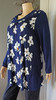 Twist neck paneled long sleeved tunic