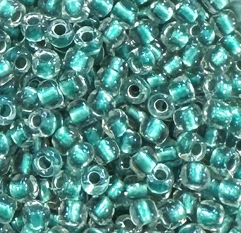 6-0264, Inside-Color Rainbow Crystal/Teal-Lined (28 gr.) Toho 
