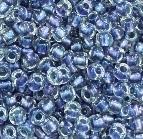 6-0265, Inside-Color Rainbow Crystal/Metallic Purple-Lined (28 gr.) Toho 