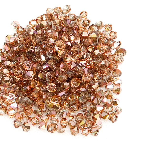 8mm Preciosa Bicones, Crystal Capri Gold (Qty: 12)