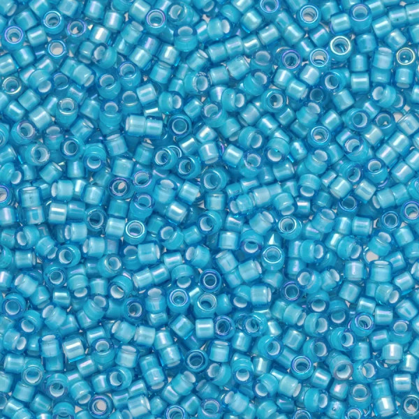 TOHO Aiko 11-931, White-Lined Aqua (5 grams)