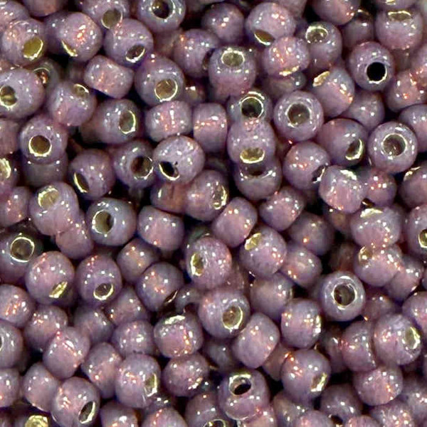 6-P0581B, PermaFinish Gilt-Lined Copper Rose Opal  (28 gr.) Toho