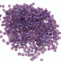 Size 11 Toho Sharp Edge Triangles-0928, Rainbow Rosaline/Opaque Purple-Lined (28 gr.)