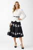 White Belted Fitted Jacket and Black A-line Floral Skirt Suit