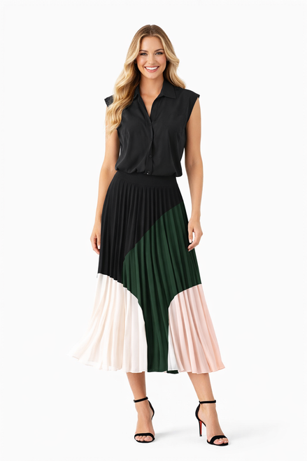Model wearing a black chiffon shirt top with a pink, green, black and white colourblock pleated midi skirt