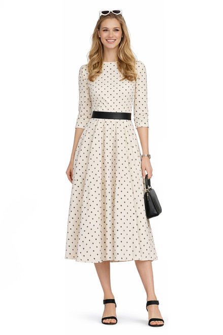 Model wearing a beige polka dot contrast-waist midi dress
