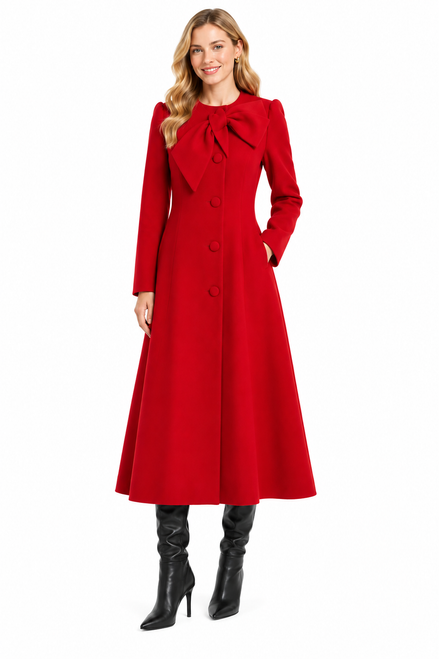 Model wearing a red button-front maxi coat dress with long sleeves and a dramatic bow-tie collar