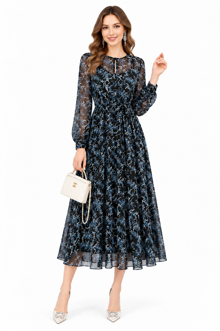 Model wearing a multicoloured floral chiffon midi dress with a high neckline, keyhole detail, long sleeves and a belted waist
