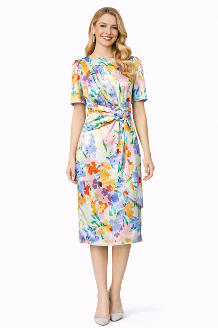 Model wearing a multicoloured floral midi dress with gathered shoulders, elbow-length sleeves, an adjustable ring-detail waist tie and side slit
