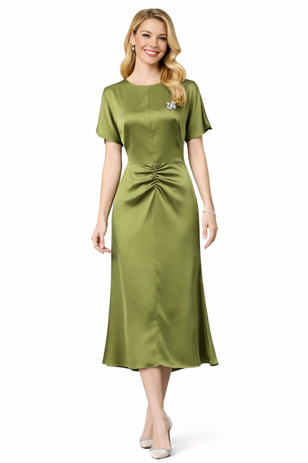 Model wearing a lime green fit-and-flare midi dress with a ruched front, tulip sleeves and a defined waist