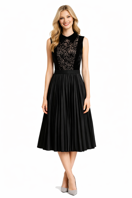 Model wearing a black sleeveless velvet top with lace inserts and a high-waisted pleated midi skirt